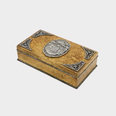 Faberge cigar box by Anders Nevalainen with silver coat of arms medallion in center of lid and four corner floral scrolls