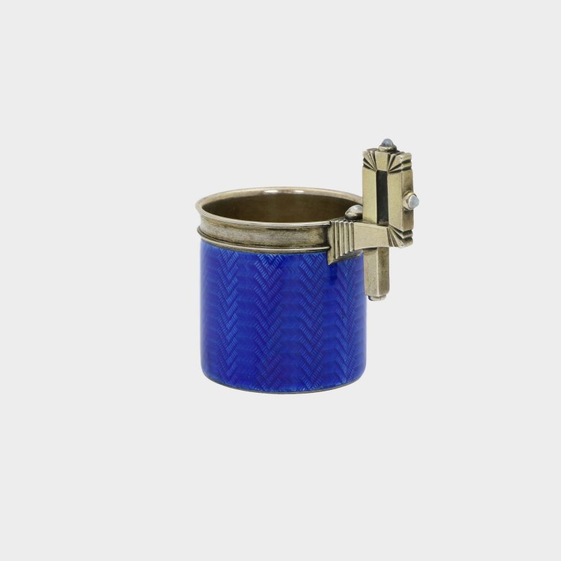 Faberge enamel cup by Anders Nevalainen enameled in blue guilloche enamel with a silver squared handle set with moonstones