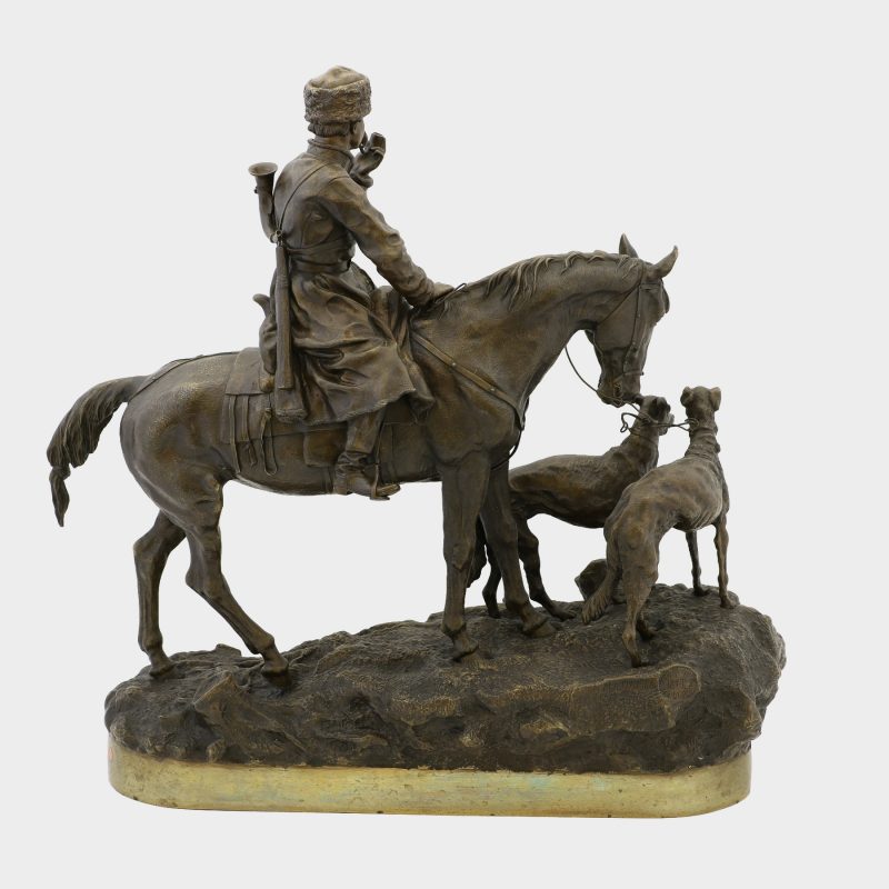 Russian bronze by Vasili Grachev of hunter on horseback smoking a pipe with two greyhounds next to horse