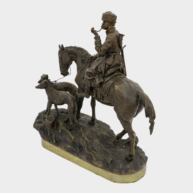 Russian bronze by Vasili Grachev of hunter on horseback smoking a pipe with two greyhounds next to horse