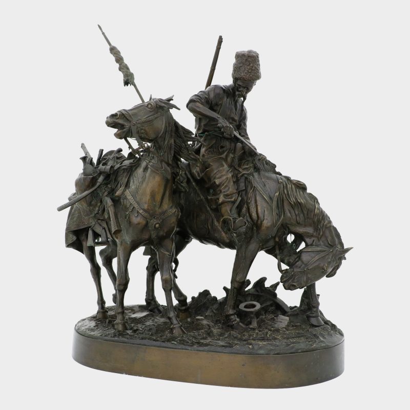 Lanceray bronze, cossack on horse wiping blood off his sword with his horse's mane, his enemy's horse tethered to his mount