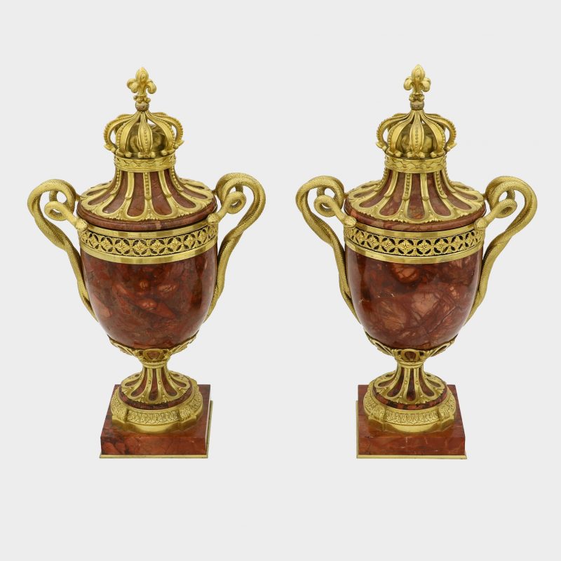 Pair of gilt-bronze mounted marble urns, handles shaped as snakes with detachable covers