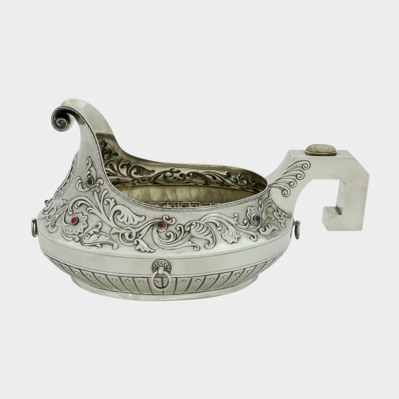 Large Russian silver kovsh, front centered by enameled coin of Empress Anna Ivanovna, handle set with oval hardstone boss
