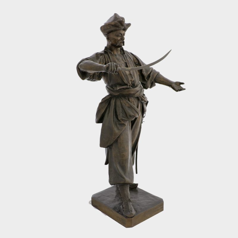 Lewandowski bronze figure of Zaporozhian cossack cast by J.C. Hernick as cossack standing on square base holding sword