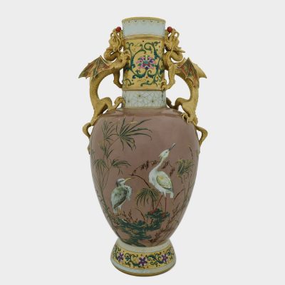 antique vase in Japanese style with gilded handles formed as winged dragons holding fire pearls in their mouths