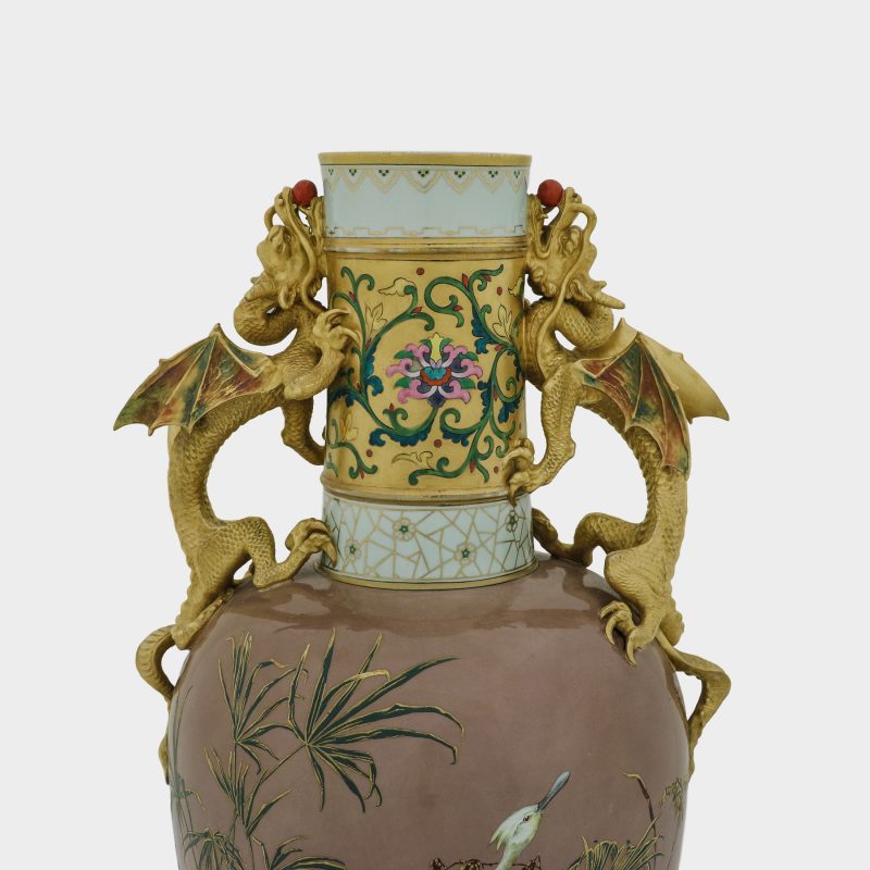 close-up of dragons holding fire pearls in their mouths on Japanese style porcelain flower pot