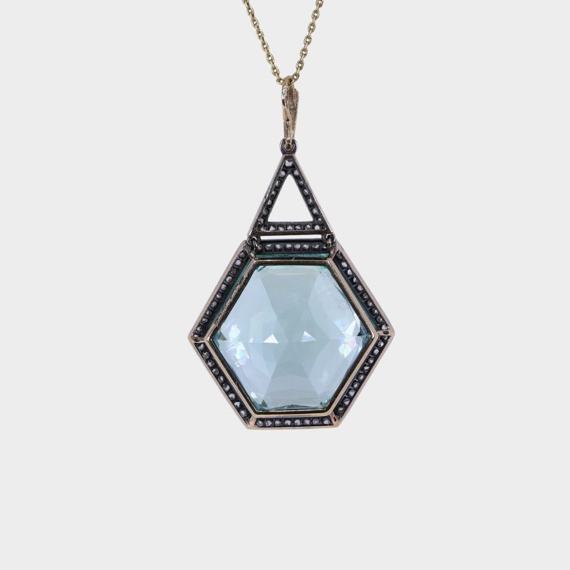 back of Russian aquamarine pendant, hexagonal aquamarine within diamond set mount with triangular diamond-set suspension ring