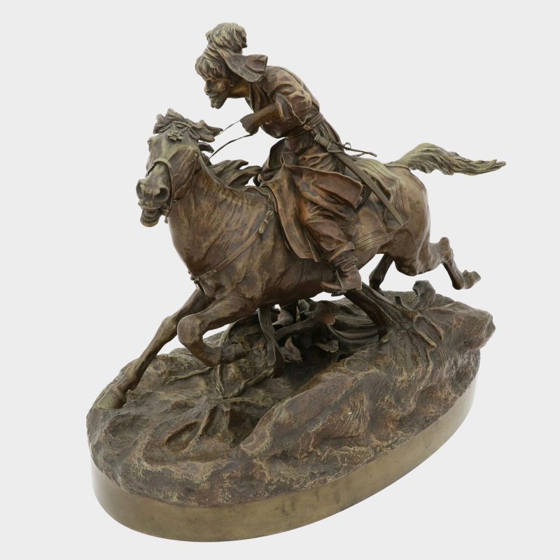 Russian bronze by Vasili Grachev cast as cossack wielding pistol on galloping horse
