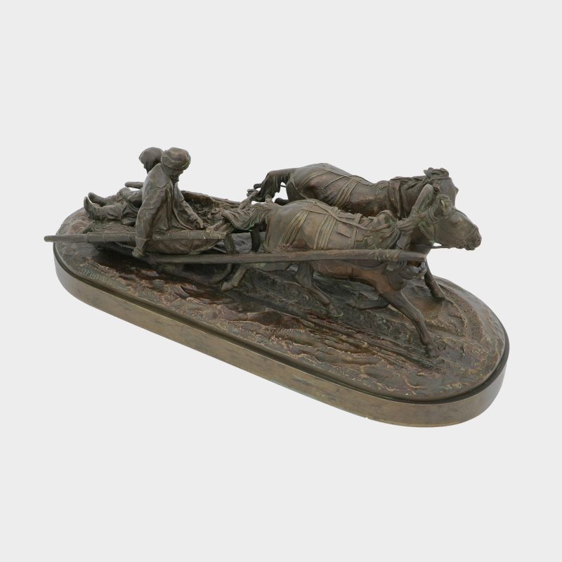 Russian bronze by Evgeny Lansere cast as man and woman bundled up for winter riding on sled pulled by two horses