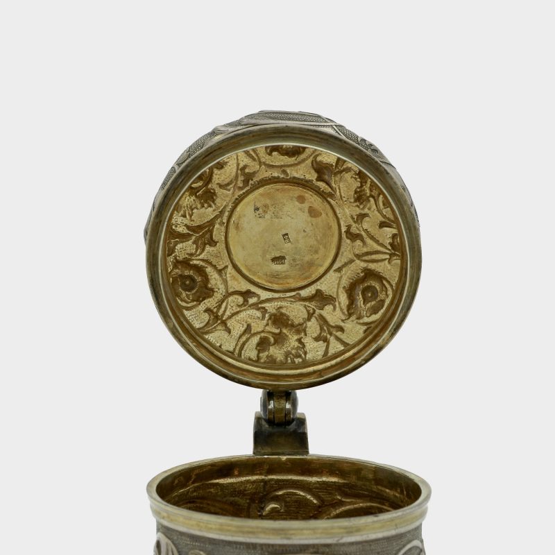 hallmarks on gilded lid of Russian silver tankard sides and domed lid decorated with scrolling foliage on stippled grounds