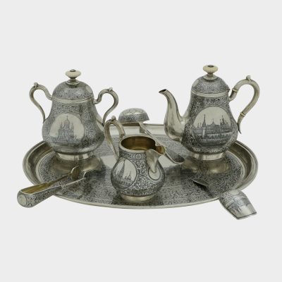 Russian silver tea set, 7 piece niello set with circular roundels depicting views of Moscow and gilded interiors
