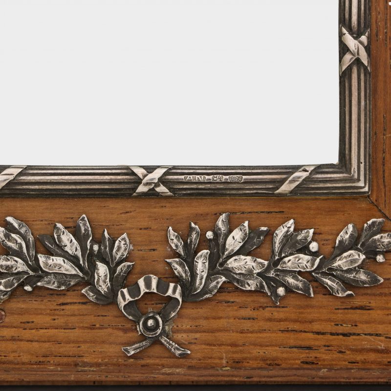 close-up of hallmarks on rectangular wood photo frame by Antti Nevalainen with silver decorations