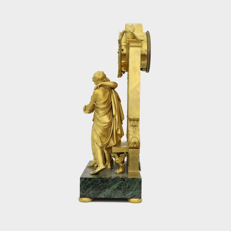 side view of Claude Galle (Attributed) Empire gilt-bronze clock on marble base modeled as couple embracing each other