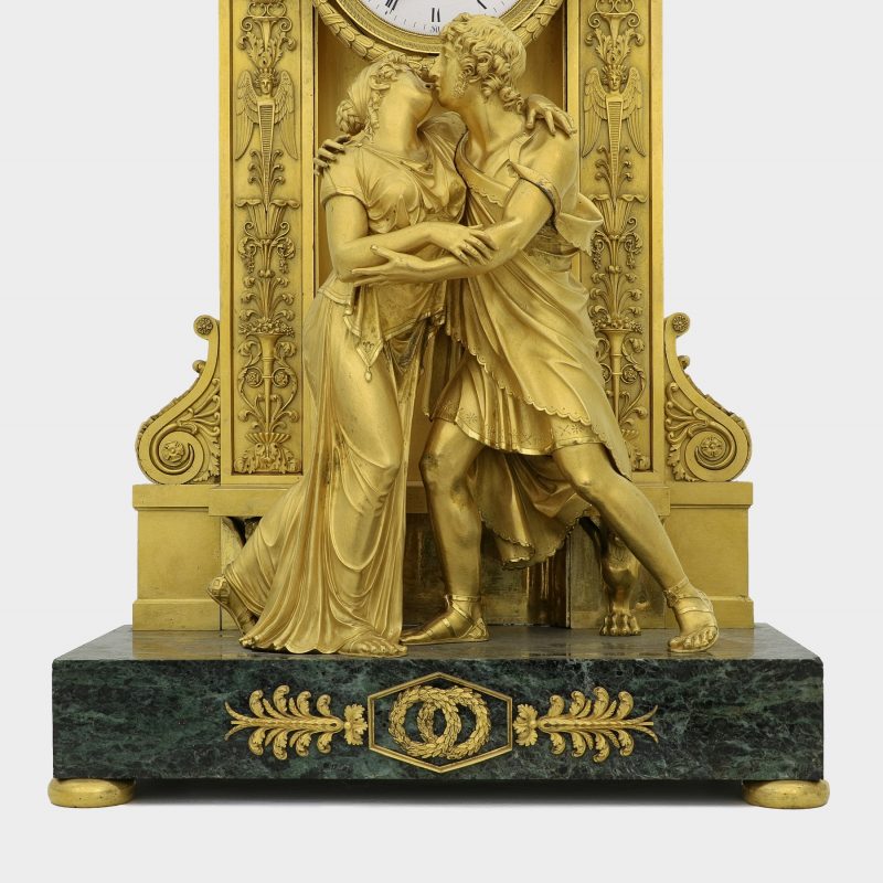close-up of Claude Galle (Attributed) Empire gilt-bronze clock on marble base modeled as couple embracing each other