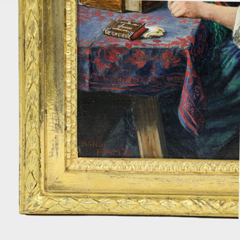 close-up of signature on painting by Hans Hamza depicting girl sitting at dressing table in front of mirror