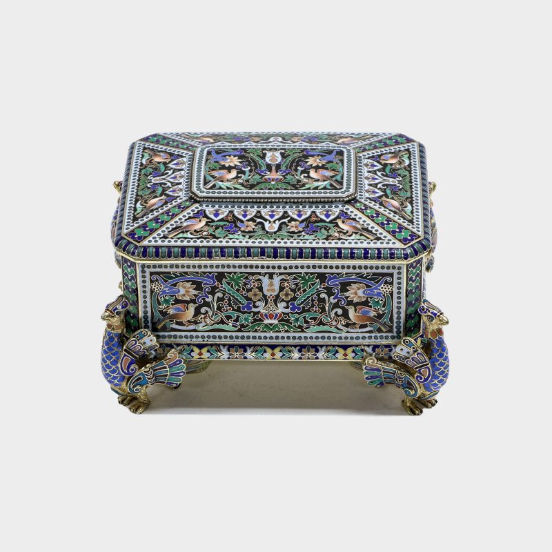 Russian silver and champleve enamel box by Pavel Ovchinnikov on four figural enameled feet shaped as peacocks