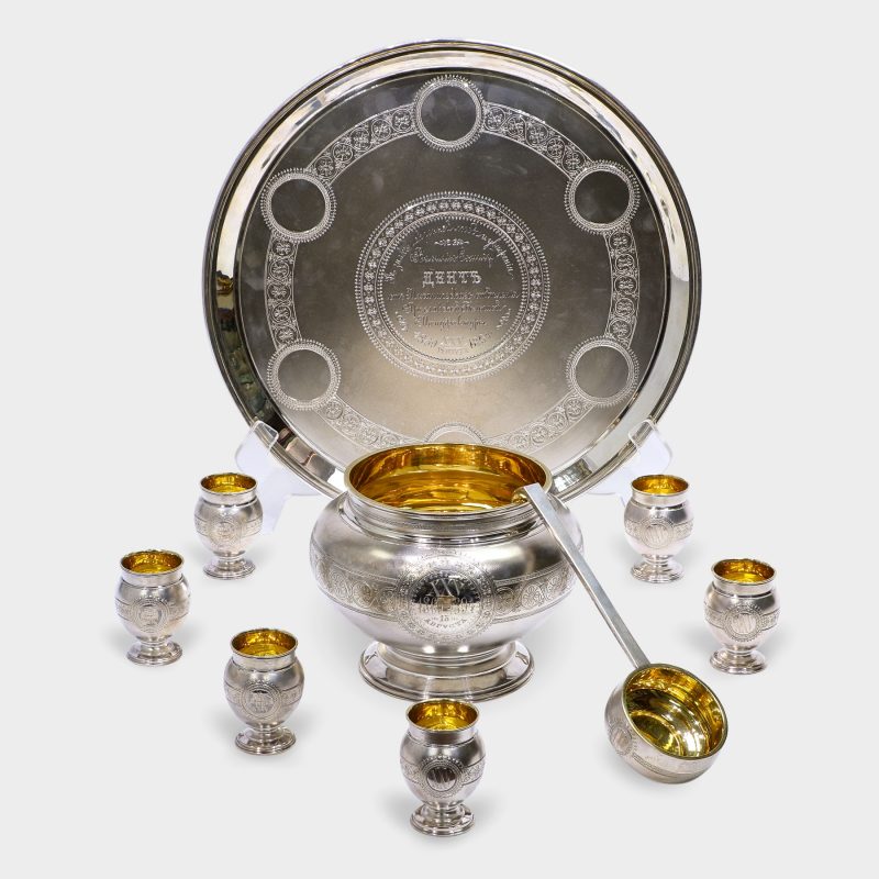 Antique Russian 9 piece silver punch service with matte finish surfaces engraved with number 25 and gilded interior