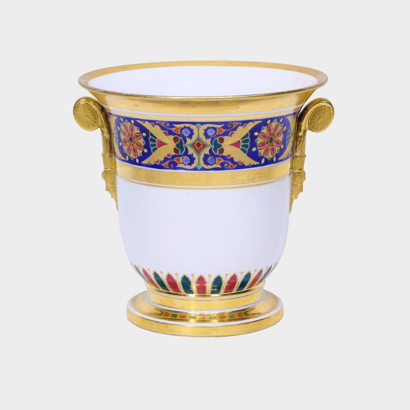 Russian porcelain wine cooler with gilt scroll handles, decorated with red, green and gilt geometric patterns on blue ground
