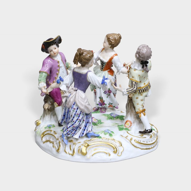 meissen porcelain figure modeled as four children dressed in 18th century clothing playing ring around rosie