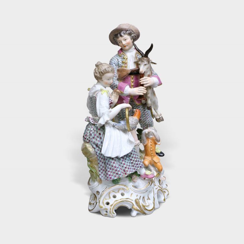 side view on Meissen porcelain figurine modeled as elegant couple with animals