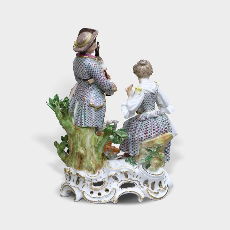 back view on Meissen porcelain figurine modeled as elegant couple with animals
