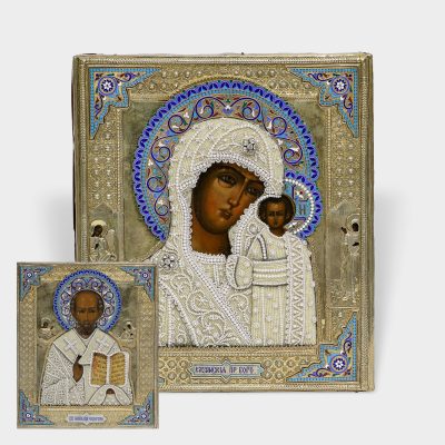 Pair of Antique Russian icons of St. Nicholas and Kazan Mother of God in silver-gilt and enamel rizas by Petr Milyukov