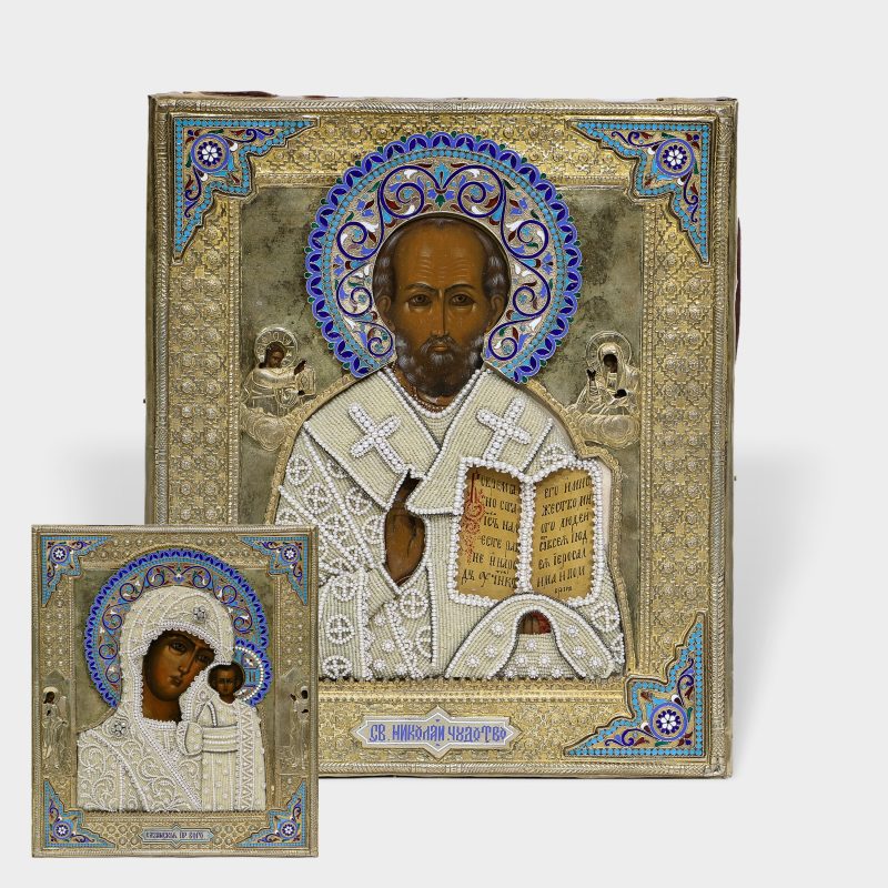 Pair of Antique Russian icons of St. Nicholas and Kazan Mother of God in silver-gilt and enamel rizas by Petr Milyukov