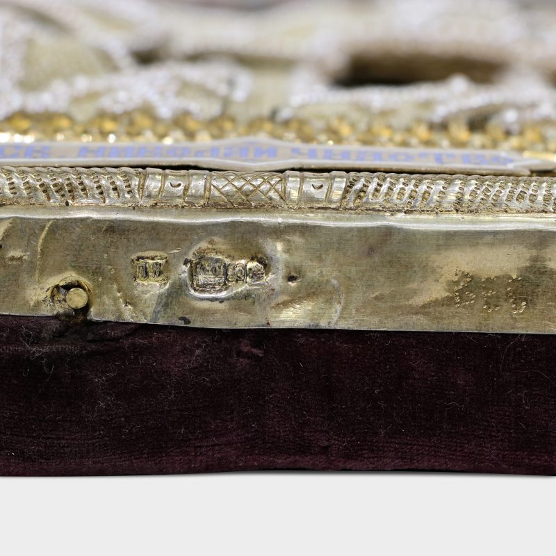 close-up of hallmarks on Antique Russian icon of St. Nicholas in silver-gilt Riza with enamel corners by Petr Milyukov